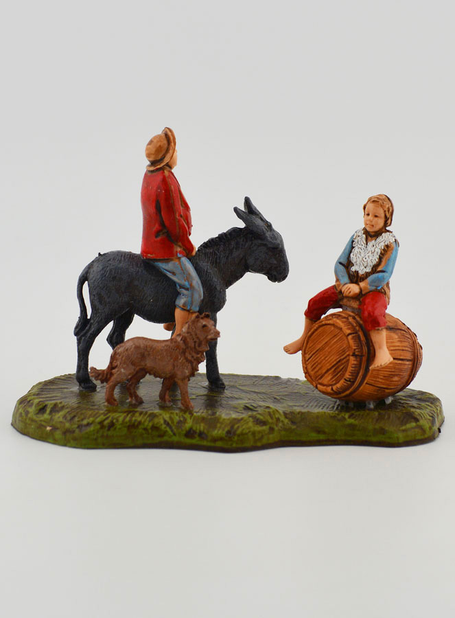 Figura de hombre en el lomo de un burro y niño - 6cm (pic 1)