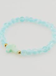 Pulsera religiosa con cruz y cuentas de vidrio azules