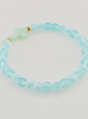 Pulsera religiosa con cruz y cuentas de vidrio azules