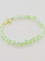 Pulsera religiosa con cruz y cuentas de vidrio verdes