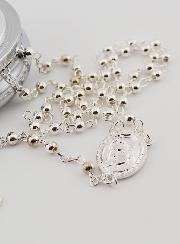 Custodia de la Virgen y el Niño con Rosario