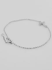 Pulsera religiosa en cruz de plata y pedrería