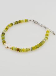 Pulsera con cruz y piedras verdes