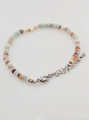 Pulsera de cruz y piedras en tonos pastel