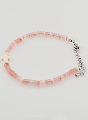 Pulsera con cruz y piedras en cristal rosa