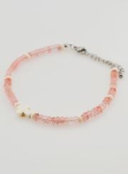 Pulsera con cruz y piedras en cristal rosa