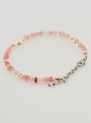 Pulsera con cruz y piedras en cristal