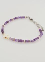 Pulsera con cruz y piedras en cristal morado