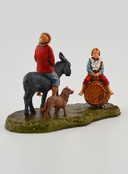 Figura de hombre en el lomo de un burro y niño - 6cm