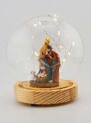 Bola de Navidad luminosa con escena de la Natividad sobre base - 14 cm